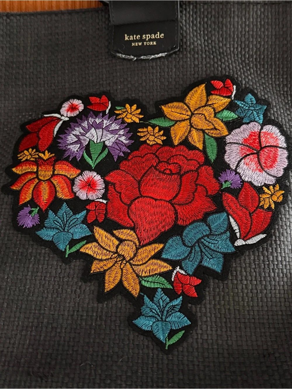 Kate Spade black tote with colorful embroidered floral heart